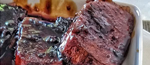 Sliced pork tenderloin in Sanbaison’s sauce